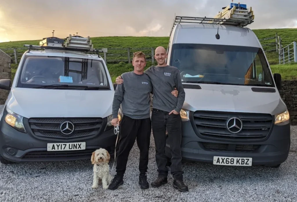 Paul Watson is the owner of Heritage Electrical. He is pictured with Tom and the dog.